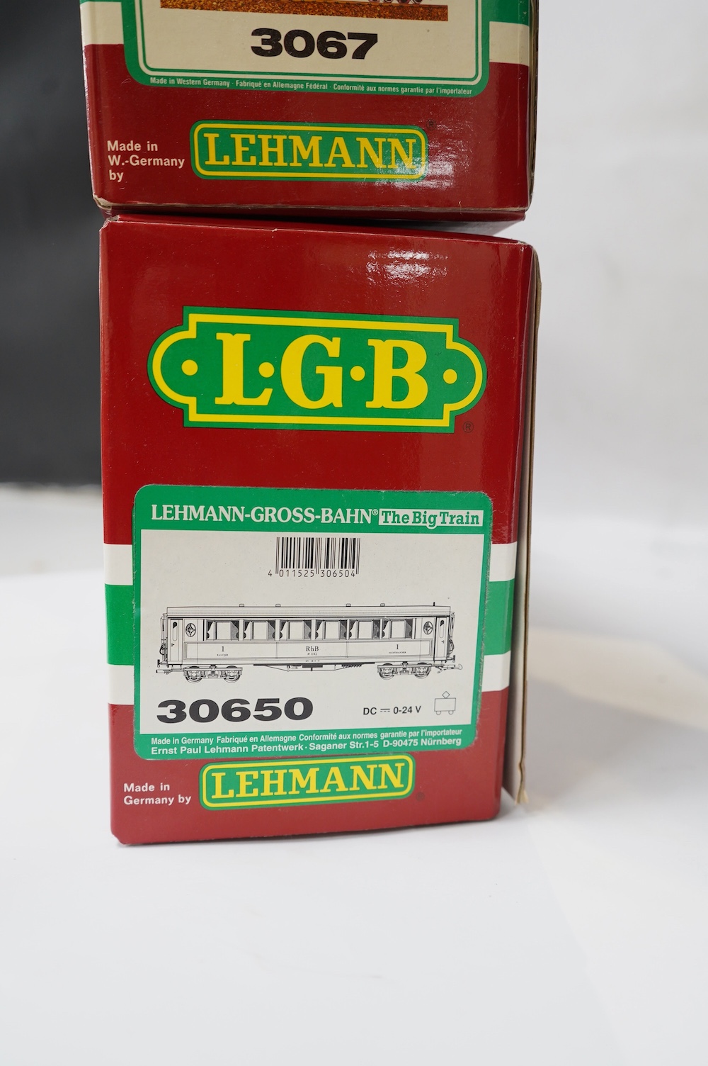 Three boxed LGB G scale Continental outline RhB bogie coaches; a Full First (30650), a restaurant car (3068), and another Full First (3067). Condition - good.